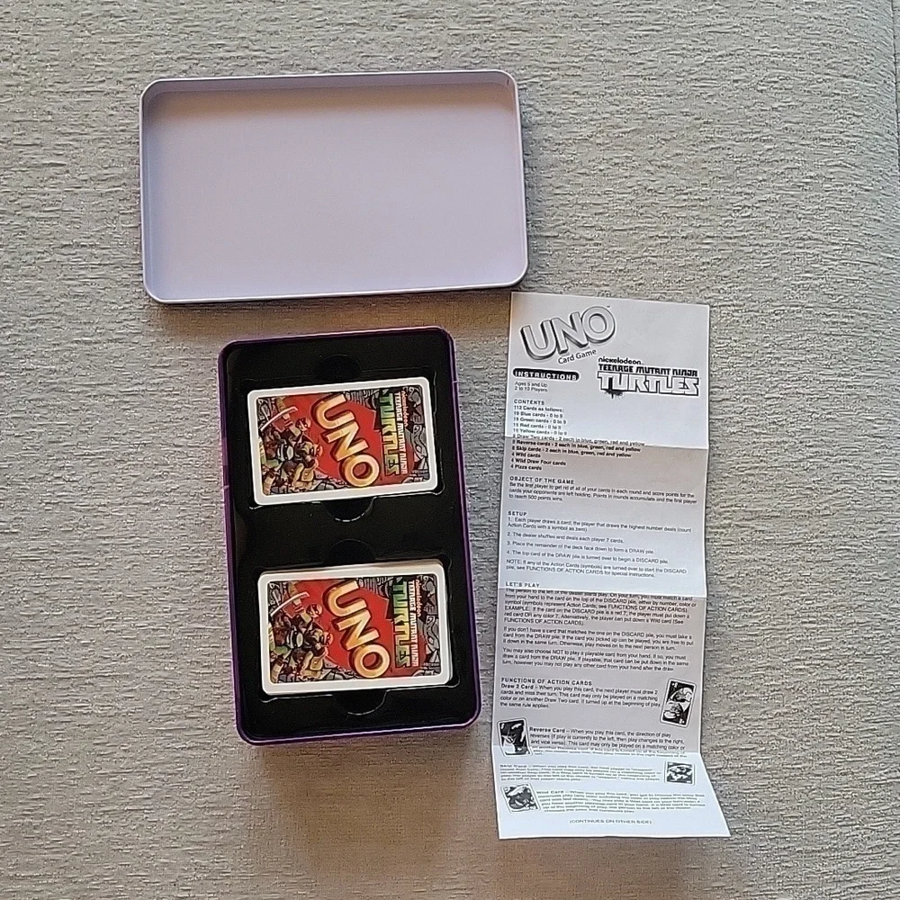 Uno Teenage Mutant Ninja Turles card game in storage tin.  Great condition.